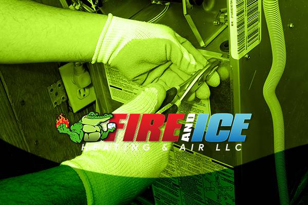 HVAC repairman with fire and ice logo